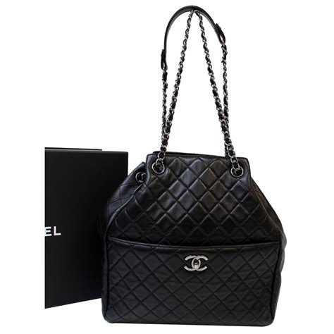 black leather chanel bag with drawstring closure